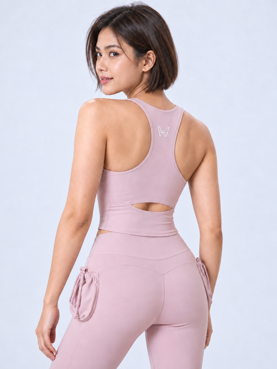 White butterfly logo on blush activewear-13
